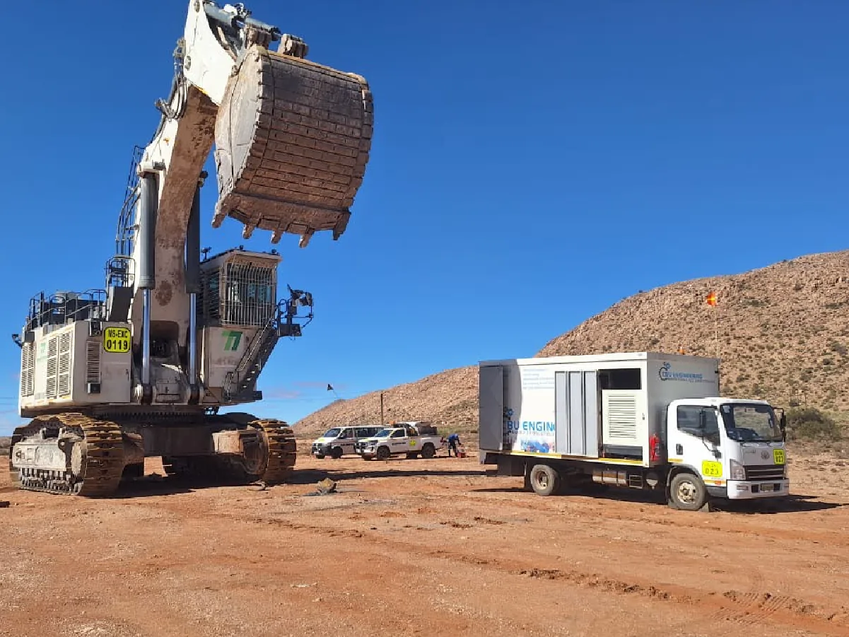 CBU Engineering field service truck positioned beside large mining equipment